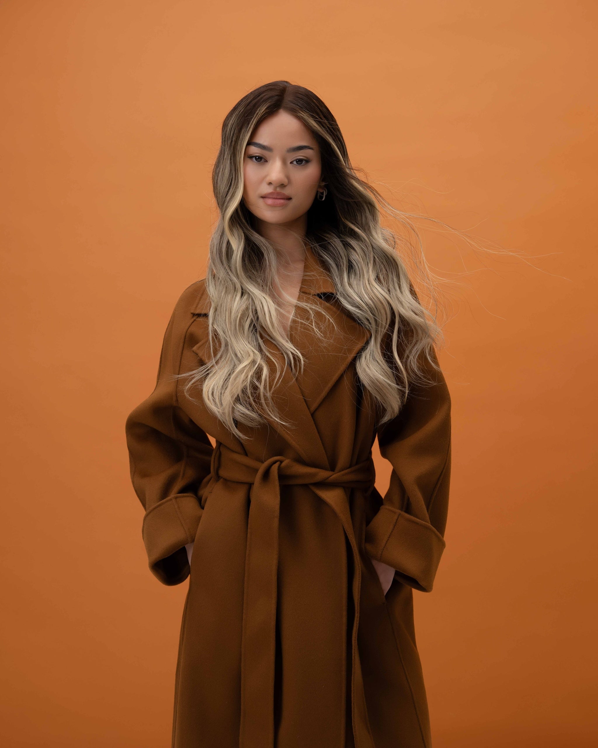 Balayage Wig 50 cm human hair with rich brown roots blending into warm blonde and brown tones, shown on model for natural dimension.