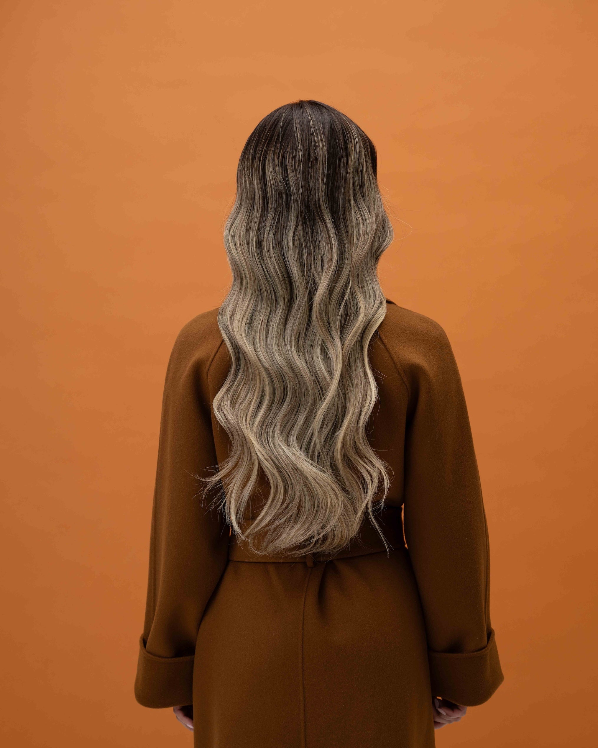 Balayage Wig 50 cm 100% Remy human hair with rich brown root fading into blonde highlights, softly layered and shown from the back.