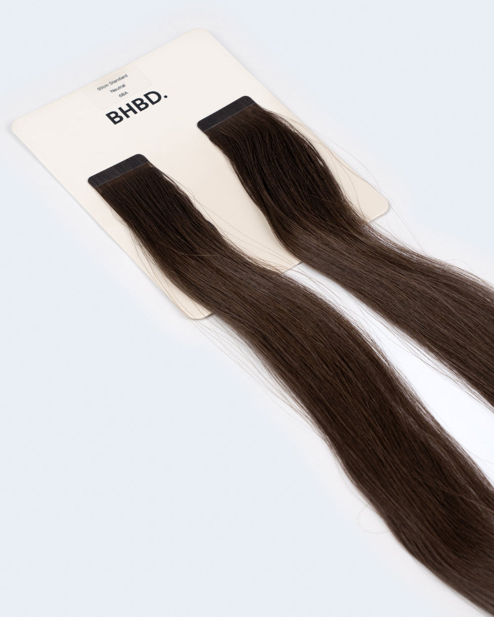 BHBD Tape Extensions 6BA – pre-taped Remy human hair extensions in rich ash brown shade; seamless, soft and tangle-free; comes in 35cm, 50cm, and 60cm. 100% Remy hair, gentle extensions.