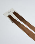 Tape Extensions 5NA/8B – pre-taped Remy human hair extensions in natural ash brown and medium blonde mix; seamless, soft and tangle-free; comes in 35cm, 50cm, and 60cm. 100% Remy hair, gentle extensions.