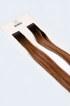 BHBD Tape Extensions 5N/5G/8G – pre-taped Remy human hair extensions in blended brown and golden blonde shades; seamless, soft and tangle-free; comes in 35cm, 50cm, and 60cm. 100% Remy hair, gentle extensions.