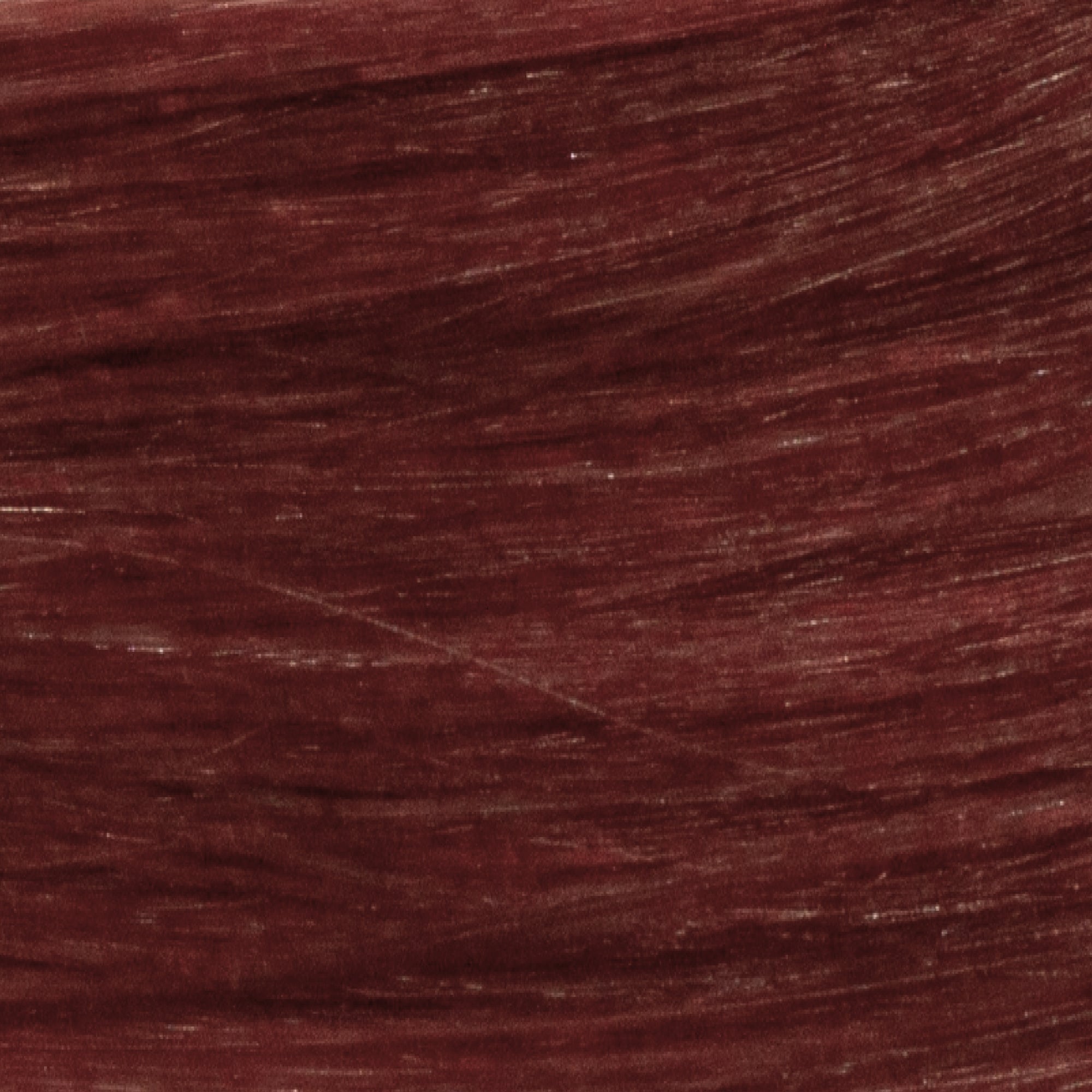 Tape Extensions 5R – pre-taped Remy human hair extensions in medium red shade; seamless, soft and tangle-free; comes in 35cm, 50cm, and 60cm. 100% Remy hair, gentle extensions.