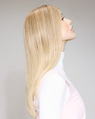 Shine Tone  Cool Beige - color mask - non  permanent color gel with nourishing care. Result shown on long blonde hair, model in side profile against grey background.