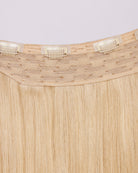 Hairband 12N – Halo hair extensions in light natural blonde showing details with the clips