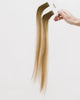 Tape Extensions 6N/11N/9NB – pre-taped Remy human hair extensions in medium natural brown, medium blonde, and natural beige blonde mix; seamless, soft and tangle-free; comes in 35cm, 50cm, and 60cm. 100% Remy hair, gentle extensions.
