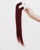 Tape Extensions 5R – pre-taped Remy human hair extensions in medium red shade; seamless, soft and tangle-free; comes in 35cm, 50cm, and 60cm. 100% Remy hair, gentle extensions.