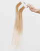 Tape Extensions 9NG/11N – pre-taped Remy human hair extensions in golden natural blonde blended with medium natural blonde; seamless, soft and tangle-free; comes in 35cm, 50cm, and 60cm. 100% Remy hair, gentle extensions.